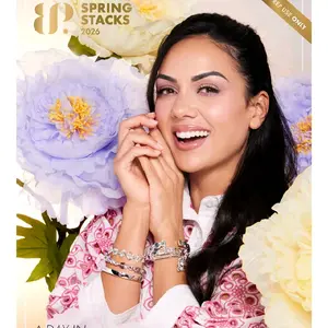 Spring Stacks 2026 Magazine Featuring Blossoming Flowers and a Smiling Woman