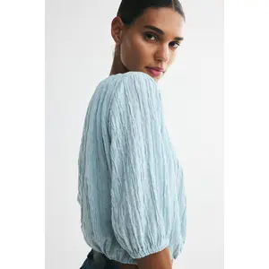H&M Textured bubble-hem blouse
