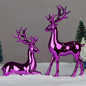 A pair of electroplated purple deer statue decorations, suitable for Christmas, Valentine's Day, New Year and various other festival decorations. It is a multi-functional home decoration that can be used in bedrooms, offices and other places.