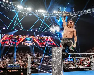 Sami Zayn WWE Unsigned Raising Title Photograph