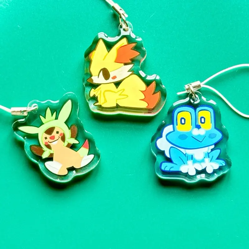 Pokémon 1.5” Acrylic Charms w/ Double Sided Epoxy: Generation 6 Starters