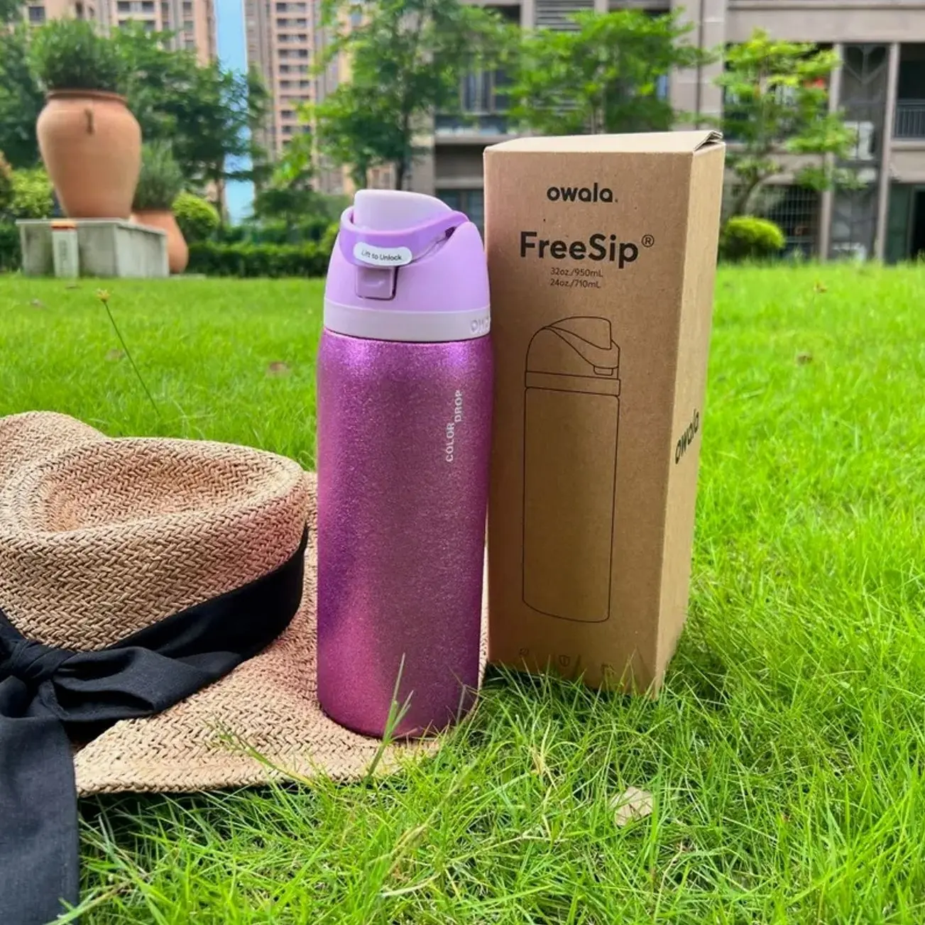 The Owala FreeSip Diamond Purple 32oz Portable Water Bottle is a leak-proof, BPA-free stainless steel cup, perfect for kids, everyday fitness, outdoor activities, travel, and gifting. It's the ideal travel water bottle for sports enthusiasts.