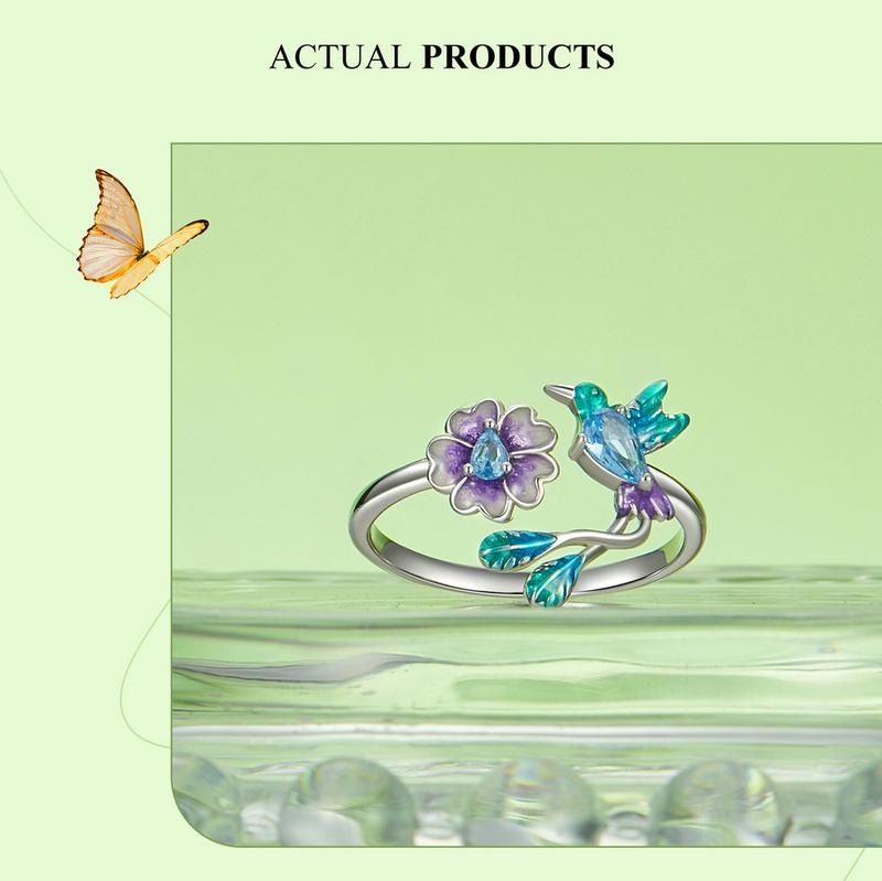 Présentation du produit : Bague ajustable BAMOER en argent sterling 925 avec motif floral et oiseau pour femme. Bague colibri en cristal, bijou scintillant à porter au quotidien, cadeau idéal pour une petite amie, une mère ou une épouse.