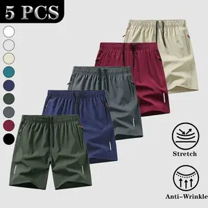 Pack of 5 quick-dry slim-fit solid-color sports casual shorts for men—breathable bottoms with zippered pockets and a drawstring waist; available in multiple sizes, suitable for fitness and outdoor wear. Men's shorts, tropical style;