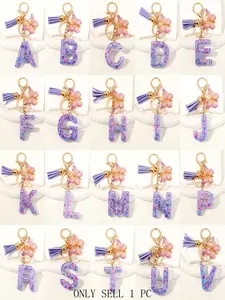 1pc/Initial key chain accessories - Glued dried flower letter key rings chain hanger - Dried flower detail - Fashionable butterfly tassel keychain - Car backpack pendant - Keychain For Bags - The top choice for Christmas gifts