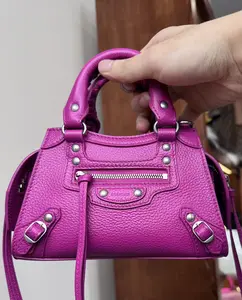 Pre-owned Balenciaga calfskin Crossbody Bags Neo Classic Mini Handbag in Fuchsia Grainy with Handbag