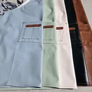 Vinyl Leather Pistachio Apron with Adjustable Straps and Dual Pockets for Kitchen Use