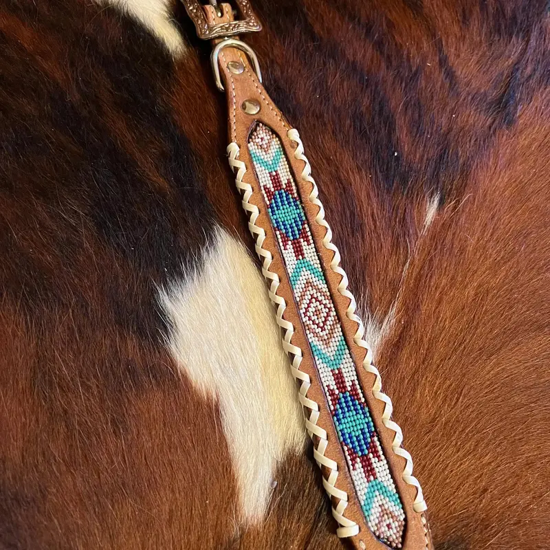 Genuine leather dog collar with teal, white, and burgundy southwest beaded inlay design and Rawhide edge