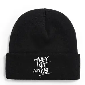 S&T They Don't Like Us Winter Beanie - "THEY NOT LIKE US" White Letter Statement Hat, Soft and Warm 100% Acrylic Unisex Black Knitted Hat with Cuff Elastic Band, Suitable for Both Men and Women