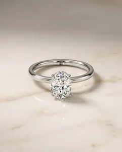 The Cyndi Hidden Halo Solitaire Engagement Ring Setting for Oval Diamonds in Platinum