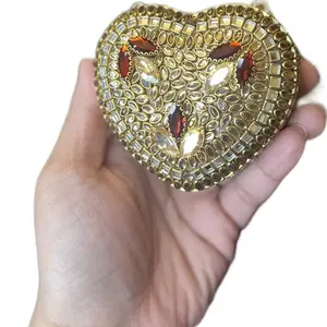 Elegant Gold-Toned Heart Kundan Clutch Perfect for Special Occasions and Evening Events