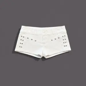 White Low-Rise Denim Mini Shorts with Silver Grommet & Floral Stud Detail Bottom Womenswear