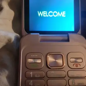 FUFFi-Foldable Mini Phone ，Glowing , 2.4 Inch Display, Dual Sim Support, Fm Radio, Fun Student & Kids Mobile Device