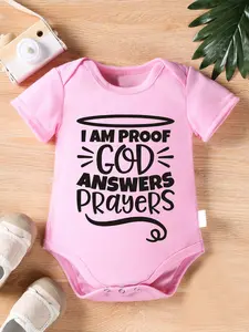 I Am Proof God Answers Prayers Baby Onesie Simple Halo Doodle Mixed Bold Cursive Script Short Sleeve Cotton Light Pink Gender Neutral Christian Faith Baby Bodysuit