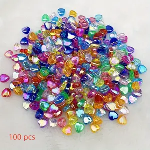 100 pcs 9mm AB Colored Heart-Shaped Acrylic Beads. These transparent, colored heart-shaped beads are suitable for making necklaces, bracelets, earrings, phone charms, keychains, and other jewelry and decorations. DIY craft material.