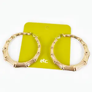 etc classic faux gold bamboo hoops (tarnish free)