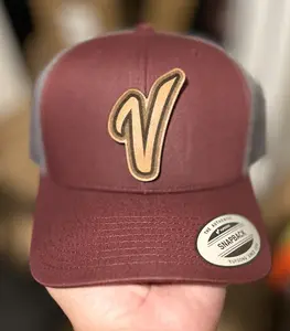 Venezuelan Baseball Logo on Brown Leather on a Trucker Hat. One Size Adjustable. Serie del Caribe