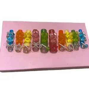 Handmade Acrylic Press-On Gummy Bear Nails with Colorful Beads and Bow Accents for Fun Nail Art