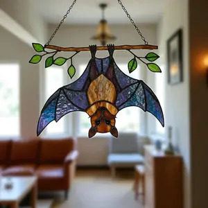 Cute bat hanging on your window! Handmade stained glass that glows in the sun  #BatDecor #StainedGlass #HomeDecor