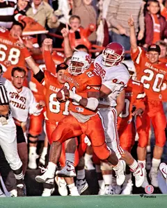 Barry Sanders Oklahoma State Cowboys Unsigned Running vs. Oklahoma Sooners Photograph