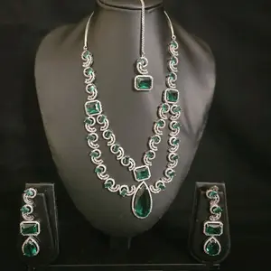 AD Necklace, Earrings & Tika Set with Elegant Design and Metallic Finish