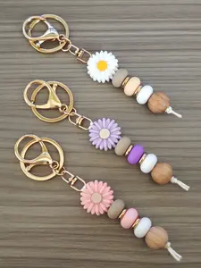 Fashionable and cute sunflower pendant keychain, suitable for daily wear, vacation and dating occasions, and also a surprising and exquisite small gift.
