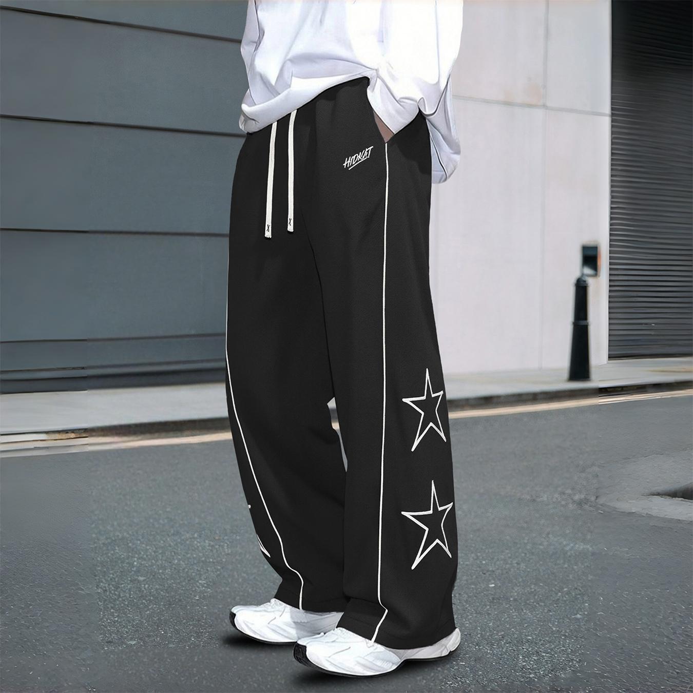 Men’s star print wide-leg track pants, drawstring streetwear sweatpants with contrast stitching, casual loose athletic bottoms for everyday wear