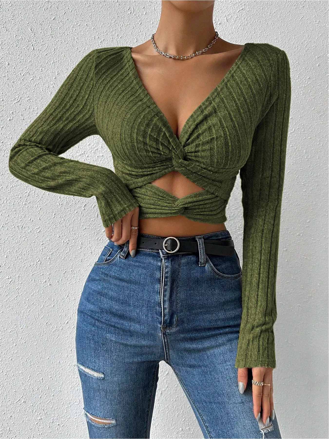 Women's minimalist long-sleeve fitted top in solid color, featuring a knot and cut-out design. Ideal for versatile daily casual wear, Womenswear