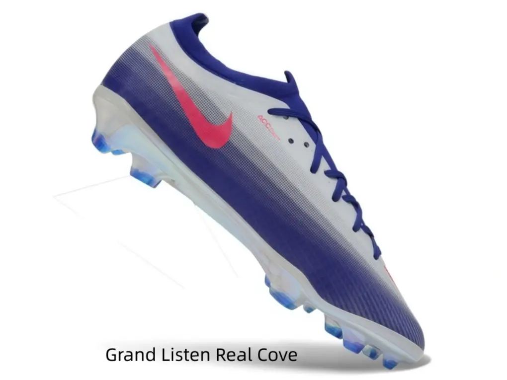 Gradient deep blue white firm-ground soccer cleats with bright pink graphic accents