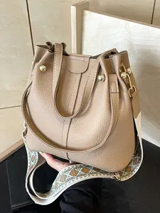 Textured bucket bag, Trendy commuting bag, Fashionable crossbody bag, adjustable shoulder strap and letter webbing, commuter crossbody bag, available in a variety of colors, suitable for daily travel, shopping, etc. Shoulder Bag