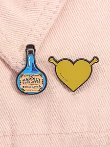 2pcs/set Shrek Enamel Pins Cartoon Green Monster Animation Perimeter Happiness Potion Green Heart Metal Brooches Lapel Backpack Badge Fashion Jewelry Accessories Gifts for Kids Friends