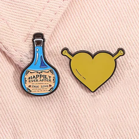 2pcs/set Shrek Enamel Pins Cartoon Green Monster Animation Perimeter Happiness Potion Green Heart Metal Brooches Alloy Brooch Pin Lapel Backpack Badge Fashion Jewelry Accessories Gifts for Kids Friends Boutonniere Pins