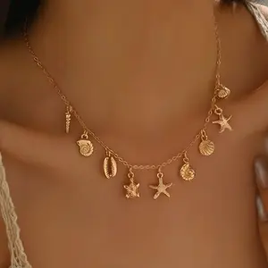Ocean Charm Necklace Delicate Multi-Pendant Chain with Seashell & Starfish Charms for Beach & Everyday Style