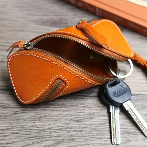 1pc Top Grain Cowhide Key Pouch, zippered creative car key organizer, retro portable small hanging bag, classic vintage styling, compact lightweight design, practical storage for car keys and small items, perfect for daily commuting