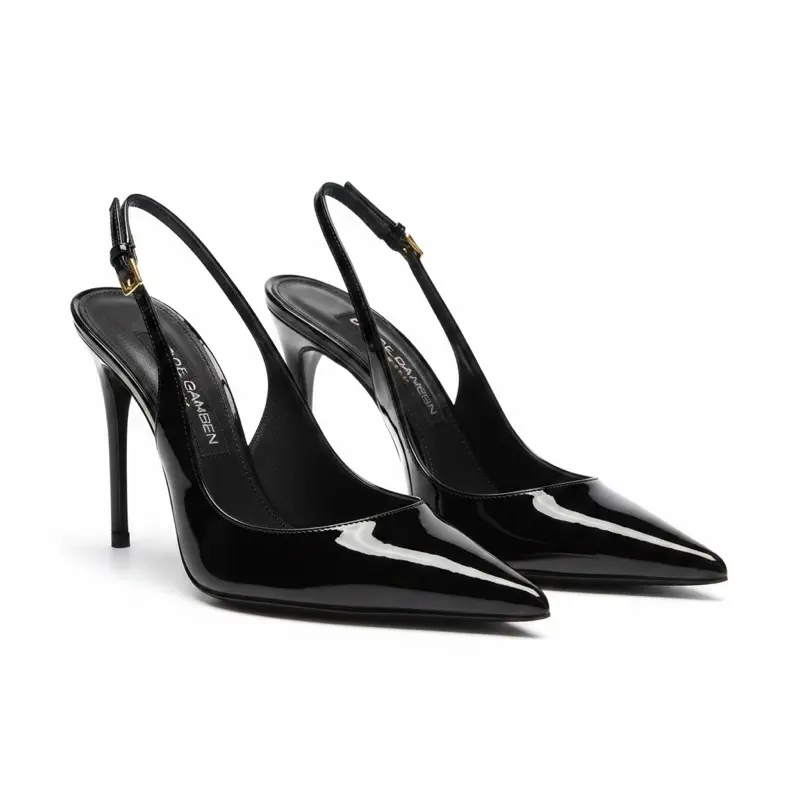 Dolce & Gabbana patent leather slingback pumps in black Size 38
