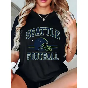 Women's Black Seattle Football Helmet 1976 Graphic T - Shirt, Game Day Outfit for Seahawks Fans, Casual Sports Fan Apparel 100% Cotton T-shirt