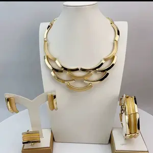 Elegant Gold-Plated Jewelry Set including Necklace and Earrings on Display Stand