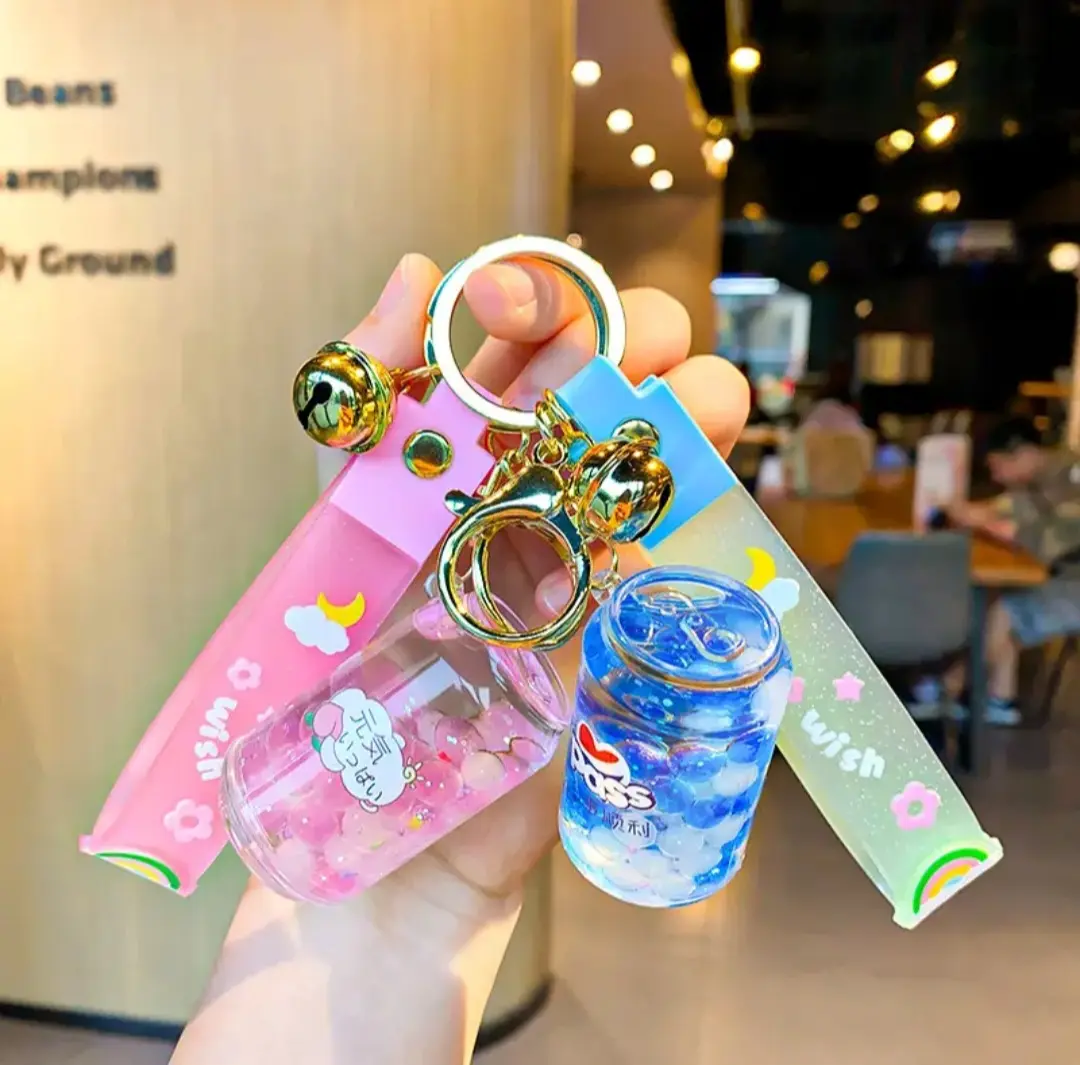 Cute Floating Liquid Can Keychain with Wrist Strap and Bell