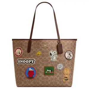 COACH x PEANUTS City 33 Tote Bag With Classic Logo Patch In Faux Leather For Women