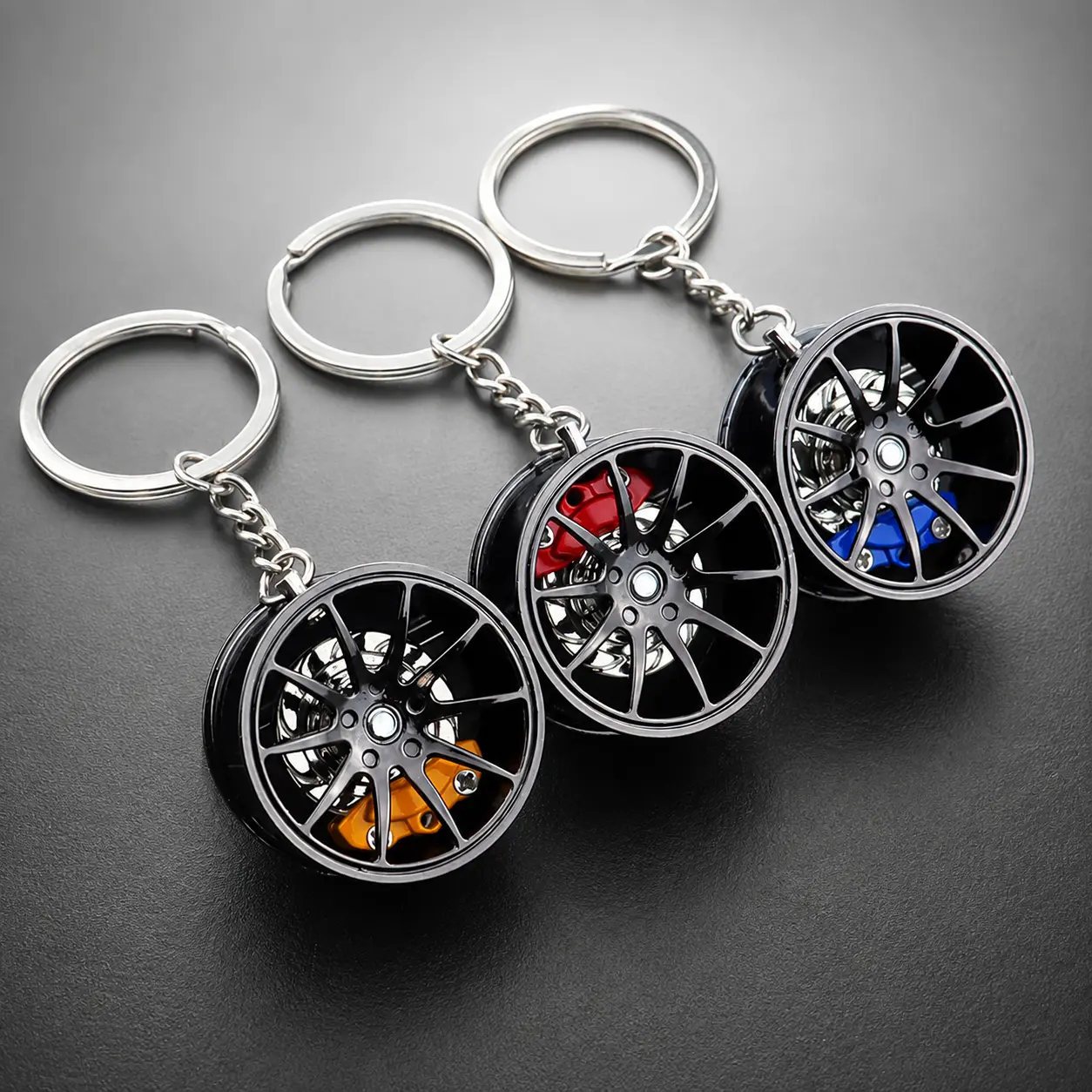 Metal wheel hub design, red brake integrated keychain, creative gift