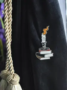 Candle & Book Stack Pin LASERBRAIN