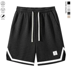 Men’s casual outdoor shorts with a waffle knit design, featuring a drawstring waistband and zippered pockets. Comfortable fabric makes them ideal for running and working out.
