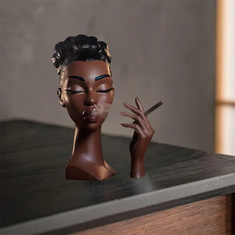 Elegant Black Incense Burner - Handmade Resin Meditation Statue with Tranquil Airflow Design, 7.87 inches high, perfect for home decor, yoga studios, and relaxation spaces. Incense Burner