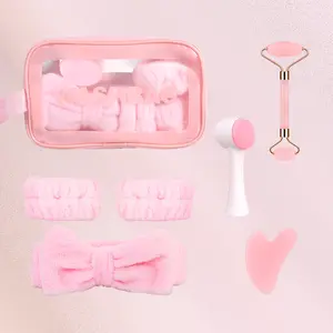 7pcs Facial Cleansing & Massage Set: 2 wristbands, 1 headband, double-sided silicone brush, double-ended roller, heart-shaped gua sha, pink storage bag. Ideal for cleansing & massage, a women's essential. Perfect Christmas gift for moms & ladies.
