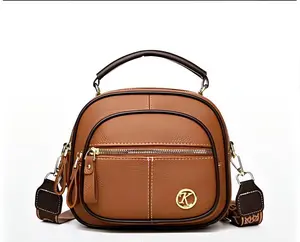 Retro-style, premium-feel versatile bag that can be carried by hand or worn crossbody