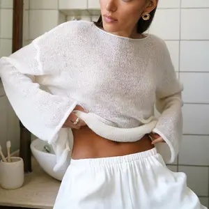 Fall new style sheer knitted top for women in loose mesh machine-woven sexy round-neck sheer thin sweater with dropped shoulders and light knitted fabric