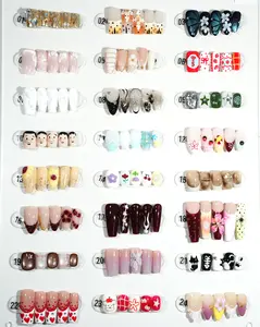 zb65..A display board featuring 24 different styles of fashionable and trendy nail art.