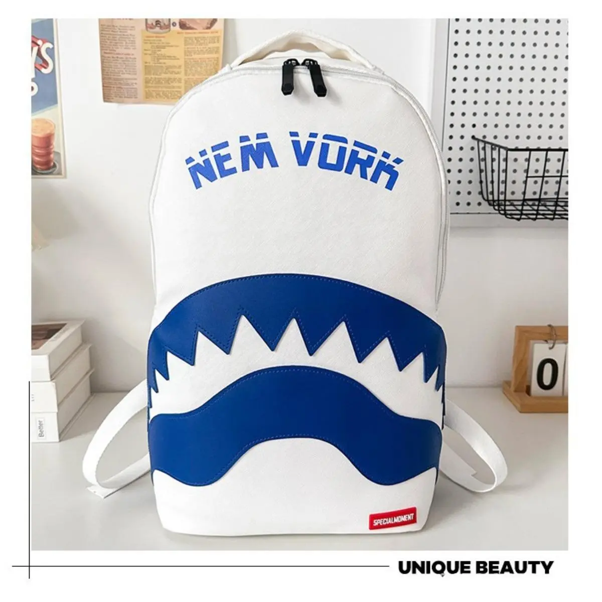 Customized shark backpack with graffiti in the SG style - a casual backpack with a large capacity, suitable for students, a trendy street-style backpack with dual shoulder straps.