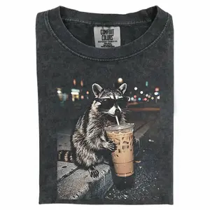 Three Raccoons Drinking Iced Coffee Comfort Colors T-Shirt with a funny Gen Z dank meme vibe, trendy cotton streetwear top and playful graphic gift for men and women alike.