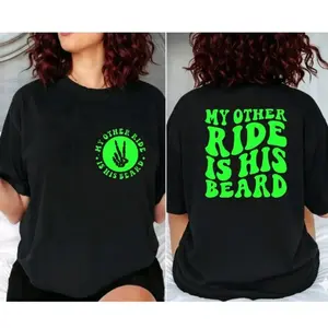 Humorous Unisex TShirt Featuring My Other Ride Is His Beard Theme Ideal for Bikers Motorcycle Enthusiasts Trending Green and Black Short Sleeve Design